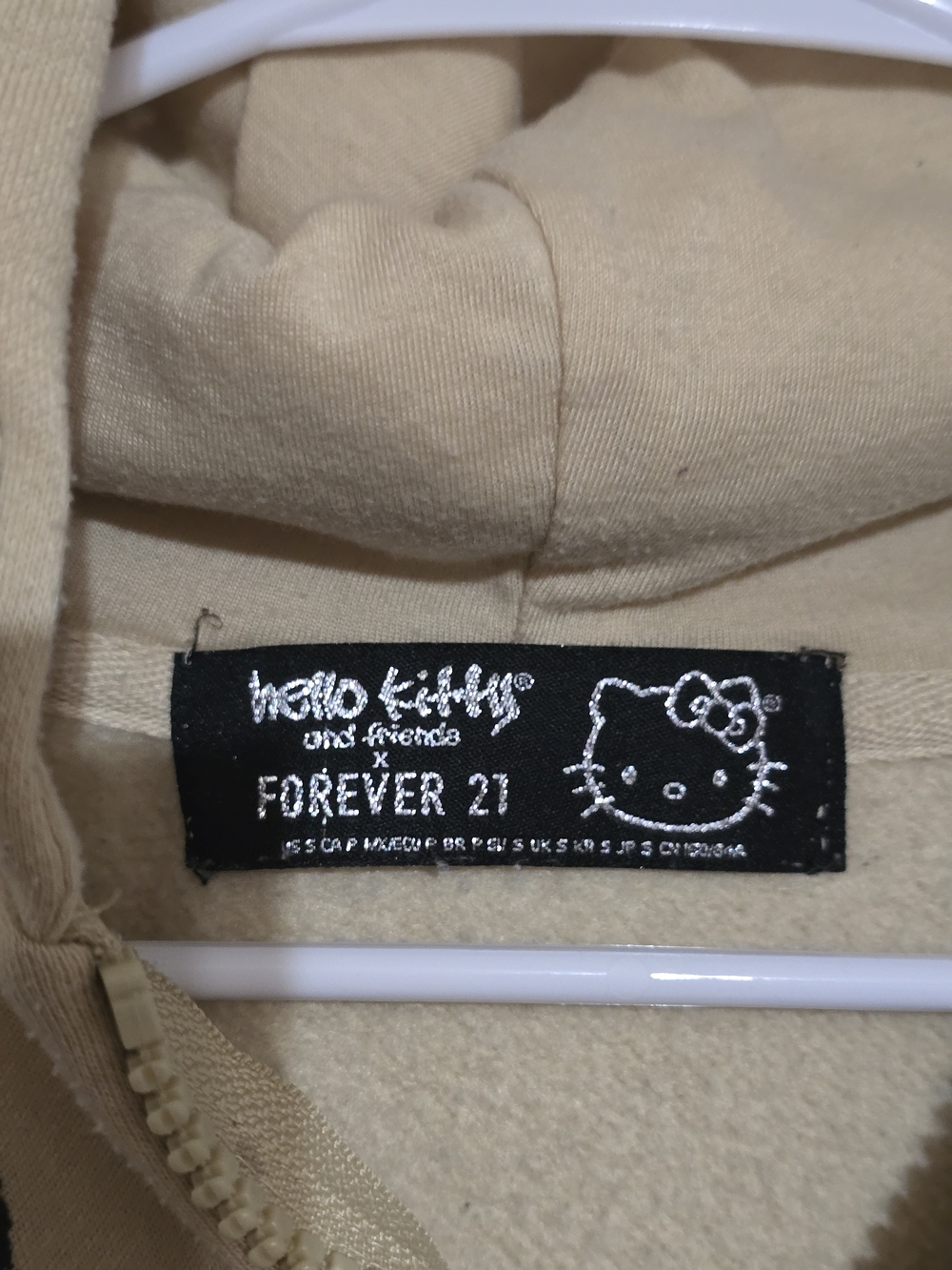 Hello Kitty Beige Hoodie with Pink Bow and Black Graphic - Picture 2 of 4